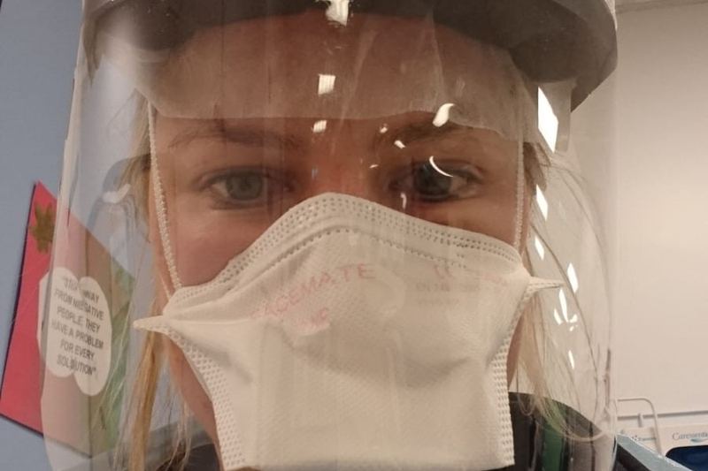 Responder wearing PPE mask, eye protection and gown